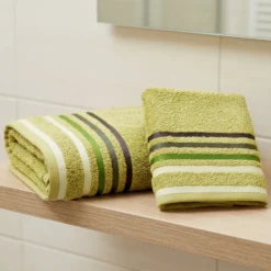 Set asciugamano medio + ospite verde erba con bordo