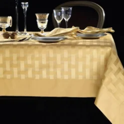Tovaglia 12 tovaglioli oro INTRECCIO in fiandra bordo applicato 180x280